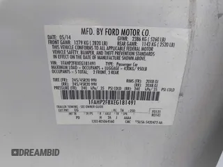2014 Ford Taurus Limited with VIN 1FAHP2F8XEG181491, listed as a IAAI auction lot 40277144 with 107,374 mi miles. Bid and sale history available at carsss.com. Image 9.