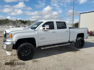 2018 GMC Sierra 2500HD SLT with VIN 1GT12TEYXJF156687, listed as a Copart auction lot 86760944 with 79,387 mi miles and Salvage Title. Bid and sale history available at carsss.com. Image 1.