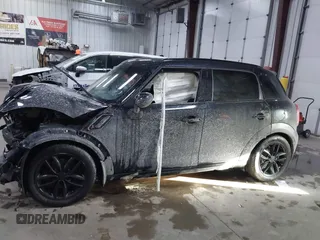 2016 MINI Countryman S z VIN WMWZC5C55GWU00739, wystawiony jako IAAI lot #41333148 z przebiegiem 74 259 mil mil oraz . Historia ofert i sprzedaży dostępna na DreamBid. Obrazek 15.