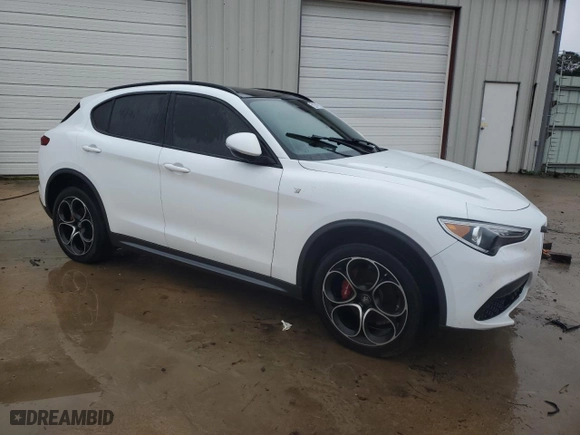 2023 Alfa Romeo Stelvio Ti with VIN ZASPAKBN7P7D54106, listed as a Copart auction lot 86400564 with 50,749 mi miles and Clean Title. Bid and sale history available at carsss.com. Image 4.
