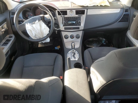 2010 Chrysler Sebring Touring with VIN 1C3CC4FB7AN141368, listed as a Copart auction lot 86410604 with 196,213 mi miles and Salvage Title. Bid and sale history available at carsss.com. Image 8.