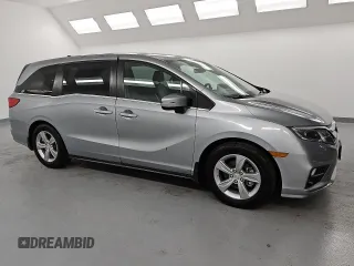 2018 Honda Odyssey EX-L с VIN 5FNRL6H78JB079617, выставлен на аукционе Copart как лот 55087295 с пробегом 185 534 миль миль и Чистый • Clean title. История ставок и продаж доступна на DreamBid. Изображение 4.