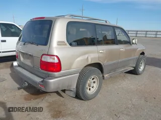 2000 Lexus LX 470 with VIN JT6HT00W0Y0098917, listed as a IAAI auction lot 41937661 with 180,980 mi miles and . Bid and sale history available at DreamBid. Image 4.