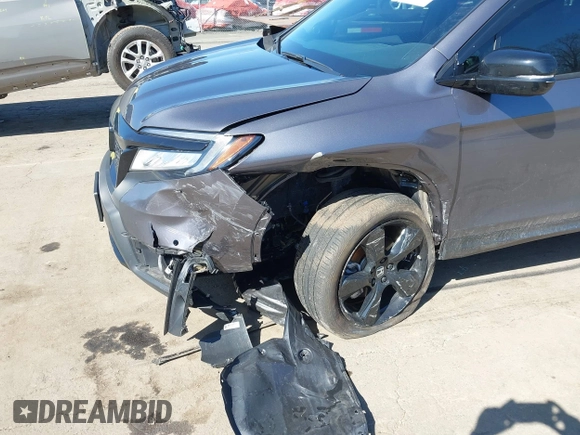 2021 Honda Passport Elite with VIN 5FNYF8H07MB018359, listed as a IAAI auction lot 41834413 with 28,278 mi miles and . Bid and sale history available at DreamBid. Image 6.