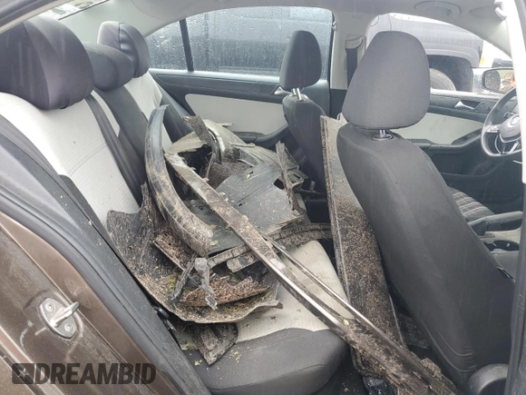 2015 Volkswagen Jetta S z VIN 3VW2K7AJ5FM293481, wystawiony jako Copart lot #58336035 z przebiegiem Nie podano mil oraz Szkoda całkowita • Salvage title. Historia ofert i sprzedaży dostępna na DreamBid. Obrazek 10.