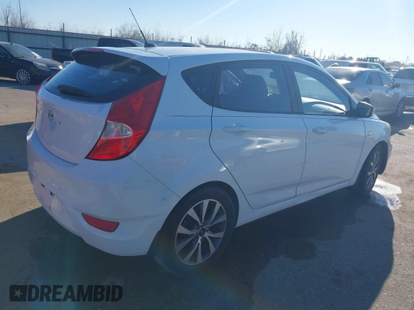 2015 Hyundai Accent Sport with VIN KMHCU5AE9FU205662, listed as a IAAI auction lot 41384496 with 80,133 mi miles. Bid and sale history available at carsss.com. Image 4.