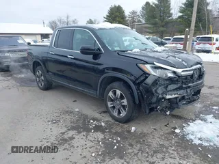 2018 Honda Ridgeline RTL-E with VIN 5FPYK3F78JB002172, listed as a IAAI auction lot 41528764 with 64,566 mi miles and . Bid and sale history available at DreamBid. Image 1.