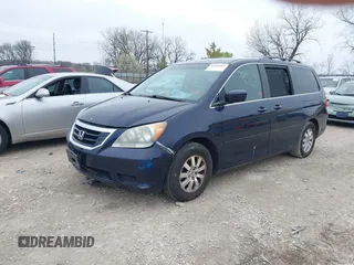 2008 Honda Odyssey EX with VIN 5FNRL38488B100013, listed as a IAAI auction lot 42019905 with 143,923 mi miles. Bid and sale history available at carsss.com. Image 2.