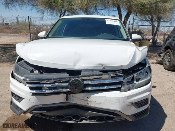 2019 Volkswagen Tiguan SE with VIN 3VV2B7AX1KM092616, listed as a IAAI auction lot 41868660 with 147,419 mi miles. Bid and sale history available at carsss.com. Image 12.