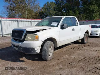 2006 Ford F-150 STX with VIN 1FTRX14W56NB45439, listed as a IAAI auction lot 41020833 with 401,176 mi miles. Bid and sale history available at carsss.com. Image 2.