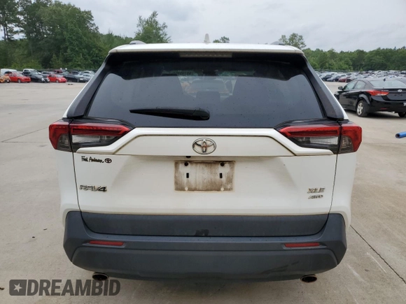 2019 Toyota RAV4 XLE with VIN 2T3P1RFV6KC060285, listed as a Copart auction lot 59195955 with 136,942 mi miles and Salvage title. Bid and sale history available at DreamBid. Image 6.