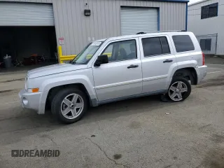 2008 Jeep Patriot Limited with VIN 1J8FT48W28D700911, listed as a Copart auction lot 47452615 with 152,602 mi miles and Salvage Title. Bid and sale history available at DreamBid. Image 1.