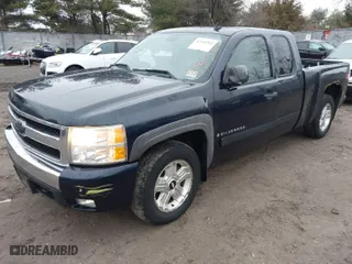 2007 Chevrolet Silverado 1500 LTZ with VIN 1GCEK19067Z521724, listed as a IAAI auction lot 41464302 with 146,935 mi miles. Bid and sale history available at carsss.com. Image 2.