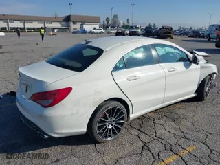 2016 Mercedes-Benz CLA with VIN WDDSJ4EB6GN333412, listed as a IAAI auction lot 34869801 with 121,179 mi miles. Bid and sale history available at carsss.com. Image 4.