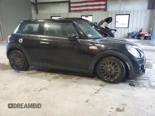 2017 MINI Hardtop Cooper S with VIN WMWXP7C50H3C61844, listed as a Copart auction lot 52209495 with 54,990 mi miles and Salvage Title. Bid and sale history available at DreamBid. Image 4.