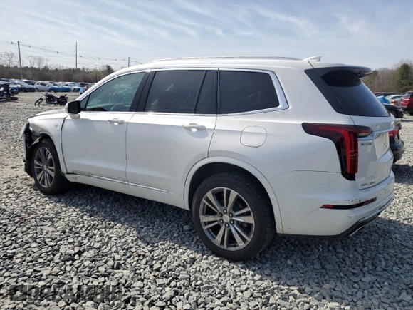 2021 Cadillac XT6 Premium Luxury with VIN 1GYKPDRS8MZ119510, listed as a Copart auction lot 51003695 with 38,157 mi miles and Salvage title. Bid and sale history available at DreamBid. Image 2.