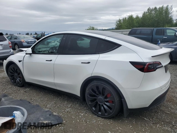 2022 Tesla Model Y Performance with VIN 7SAYGDEFXNF396758, listed as a Copart auction lot 59006365 with 47,882 mi miles and Salvage title. Bid and sale history available at DreamBid. Image 2.
