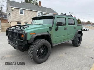 2005 Hummer H2 z VIN 5GRGN22U85107767, wystawiony jako Copart lot #56570325 z przebiegiem 197 076 mil mil oraz Tytuł czysty. Historia ofert i sprzedaży dostępna na DreamBid. Obrazek 2.
