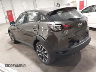 2019 Mazda CX-3 Touring z VIN JM1DKFC79K0442432, wystawiony jako IAAI lot #42153025 z przebiegiem 69 187 mil mil oraz . Historia ofert i sprzedaży dostępna na DreamBid. Obrazek 3.