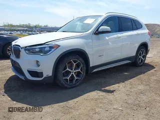 2018 BMW X1 xDrive28i with VIN WBXHT3C39J5F91912, listed as a IAAI auction lot 42099647 with 79,023 mi miles and . Bid and sale history available at DreamBid. Image 2.