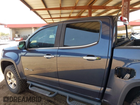 2018 Chevrolet Colorado 4WD Z71 z VIN 1GCGTDEN9J1231315, wystawiony jako IAAI lot #42440943 z przebiegiem 171 061 mil mil oraz . Historia ofert i sprzedaży dostępna na DreamBid. Obrazek 14.