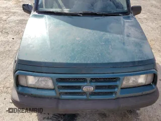 1996 Chevrolet Tracker z VIN 2CNBJ1863T6925397, wystawiony jako Copart lot #50446605 z przebiegiem 139 484 mil mil oraz Czysty tytuł • Clean title. Historia ofert i sprzedaży dostępna na DreamBid. Obrazek 11.