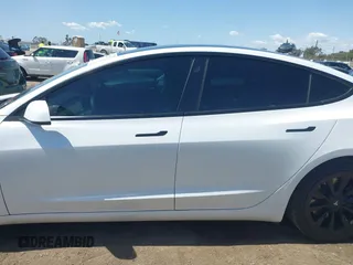 2022 Tesla Model 3 Long Range with VIN 5YJ3E1EB1NF289719, listed as a IAAI auction lot 41968273 with 73,368 mi miles and . Bid and sale history available at DreamBid. Image 15.