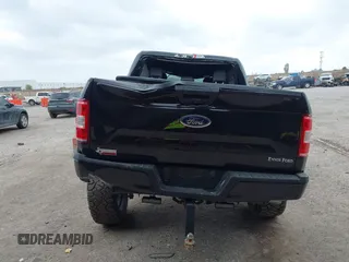 2020 Ford F-150 XL with VIN 1FTEW1E5XLKF16129, listed as a IAAI auction lot 42121449 with Not provided miles and . Bid and sale history available at DreamBid. Image 16.