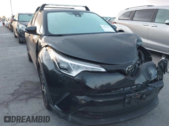 2019 Toyota C-HR XLE with VIN JTNKHMBXXK1034717, listed as a IAAI auction lot 41939078 with 56,309 mi miles. Bid and sale history available at carsss.com. Image 1.