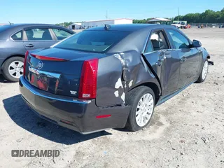 2013 Cadillac CTS Luxury with VIN 1G6DE5E5XD0146158, listed as a IAAI auction lot 42531205 with 130,669 mi miles and . Bid and sale history available at DreamBid. Image 4.