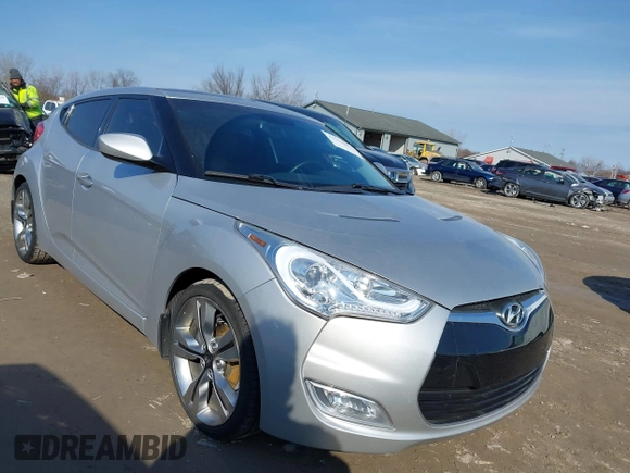 2012 Hyundai Veloster w/Black Int with VIN KMHTC6AD7CU063968, listed as a IAAI auction lot 41764263 with 83,634 mi miles and . Bid and sale history available at DreamBid. Image 1.