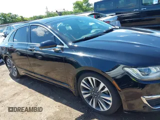 2017 Lincoln MKZ Reserve z VIN 3LN6L5E97HR650179, wystawiony jako IAAI lot #42366592 z przebiegiem 98 224 mil mil oraz . Historia ofert i sprzedaży dostępna na DreamBid. Obrazek 14.