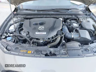 2024 Mazda 3 Carbon Edition with VIN 3MZBPBXY0RM404743, listed as a IAAI auction lot 41291652 with 18,231 mi miles and . Bid and sale history available at DreamBid. Image 10.