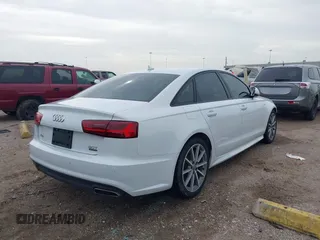 2018 Audi A6 Premium Plus z VIN WAUG3AFC7JN041708, wystawiony jako IAAI lot #41670779 z przebiegiem 91 753 mil mil oraz . Historia ofert i sprzedaży dostępna na DreamBid. Obrazek 4.