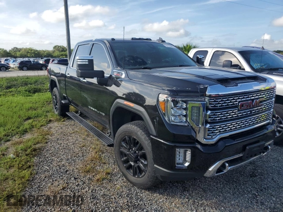 2023 GMC Sierra 3500HD Denali z VIN 1GT49WEY9PF135123, wystawiony jako Copart lot #74175484 z przebiegiem Nie podano mil oraz Nie do naprawy • Non repairable. Historia ofert i sprzedaży dostępna na DreamBid. Obrazek 4.