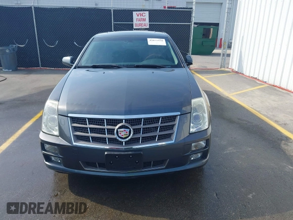 2009 Cadillac STS AWD w/1SB with VIN 1G6DD67V090151883, listed as a IAAI auction lot 42075438 with 97,408 mi miles. Bid and sale history available at carsss.com. Image 13.
