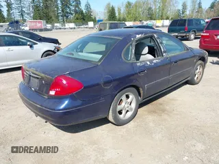 2000 Ford Taurus SES with VIN 1FAFP55S7YA240929, listed as a IAAI auction lot 42040583 with 179,159 mi miles and . Bid and sale history available at DreamBid. Image 4.