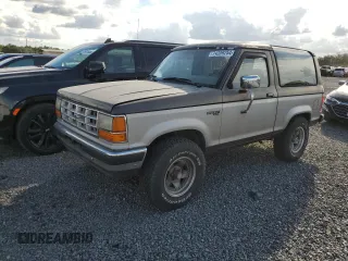 1990 Ford Bronco z VIN 1FMCU14T4LUA75868, wystawiony jako Copart lot #74209254 z przebiegiem 828 308 mil mil oraz Szkoda całkowita • Salvage title. Historia ofert i sprzedaży dostępna na DreamBid. Obrazek 1.