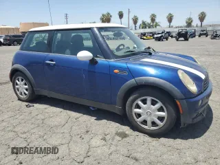 2004 MINI Hardtop z VIN WMWRC334X4TC51451, wystawiony jako Copart lot #61268235 z przebiegiem 149 750 mil mil oraz Szkoda całkowita • Salvage title. Historia ofert i sprzedaży dostępna na DreamBid. Obrazek 4.