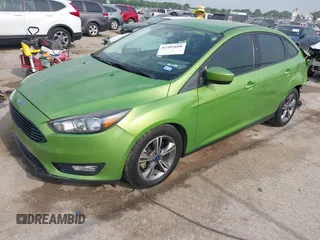 2018 Ford Focus SE z VIN 1FADP3FE5JL222542, wystawiony jako IAAI lot #42265608 z przebiegiem 107 397 mil mil oraz . Historia ofert i sprzedaży dostępna na DreamBid. Obrazek 2.