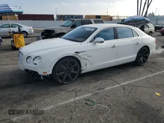 2015 Bentley Flying Spur with VIN SCBEC9ZAXFC041601, listed as a Copart auction lot 62028895 with 43,943 mi miles and Salvage title. Bid and sale history available at DreamBid. Image 1.