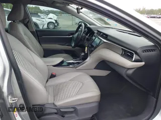 2019 Toyota Camry LE z VIN 4T1B11HK9KU708465, wystawiony jako IAAI lot #41921754 z przebiegiem 119 106 mil mil oraz . Historia ofert i sprzedaży dostępna na DreamBid. Obrazek 5.