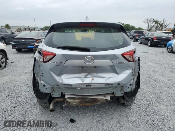 2016 Mazda CX-5 Sport with VIN JM3KE4BY1G0799275, listed as a Copart auction lot 51202355 with 98,409 mi miles and Non Repairable. Bid and sale history available at carsss.com. Image 6.