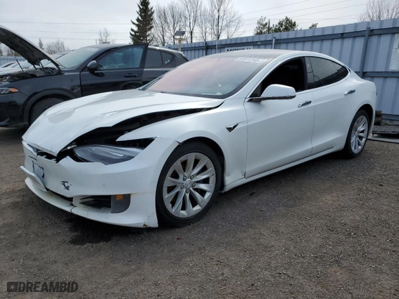 2017 Tesla Model S 100D with VIN 5YJSA1E24HF186757, listed as a Copart auction lot 51511745 with 242,779 mi miles and Salvage Title. Bid and sale history available at carsss.com. Image 1.