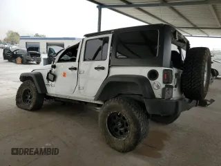 2013 Jeep Wrangler Unlimited Sport z VIN 1C4BJWDG8DL513680, wystawiony jako Copart lot #53805485 z przebiegiem 135 676 mil mil oraz Szkoda całkowita • Salvage title. Historia ofert i sprzedaży dostępna na DreamBid. Obrazek 2.