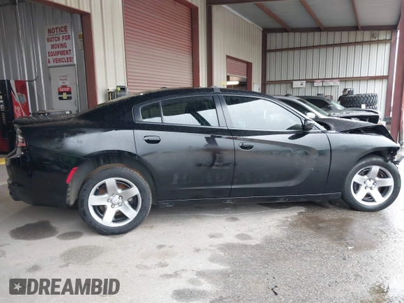 2021 Dodge Charger Police with VIN 2C3CDXAT5MH663136, listed as a IAAI auction lot 40348927 with 66,501 mi miles and . Bid and sale history available at DreamBid. Image 14.
