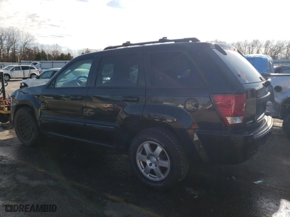 2009 Jeep Grand Cherokee Laredo with VIN 1J8GS48K09C525473, listed as a Copart auction lot 84880384 with 144,419 mi miles and Salvage Title. Bid and sale history available at carsss.com. Image 2.