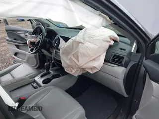 2019 Honda Pilot EX-L with VIN 5FNYF6H5XKB096065, listed as a IAAI auction lot 42631239 with 171,768 mi miles and . Bid and sale history available at DreamBid. Image 5.