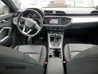 2020 Audi Q3 Premium with VIN WA1AECF31L1002342, listed as a Copart auction lot 60729665 with 29,154 mi miles and Salvage title. Bid and sale history available at DreamBid. Image 8.
