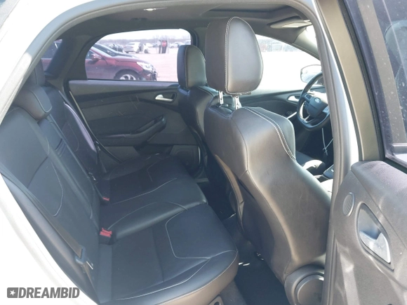 2015 Ford Focus ST with VIN 1FADP3L98FL292289, listed as a IAAI auction lot 41670338 with 100,742 mi miles. Bid and sale history available at carsss.com. Image 8.